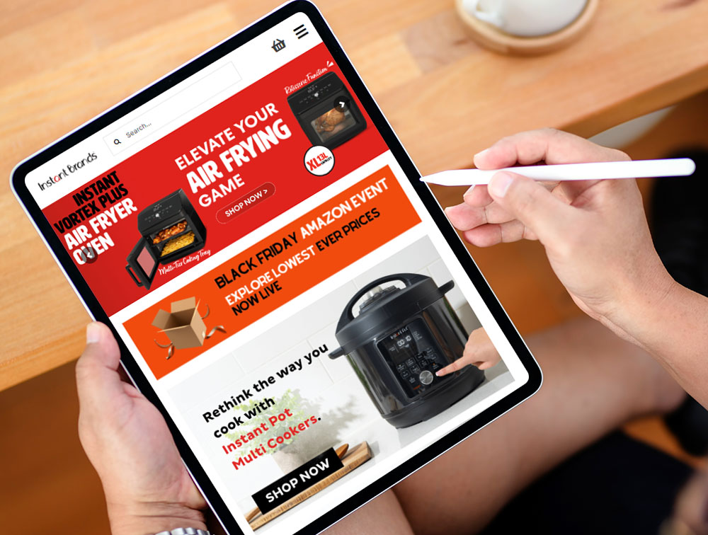 iPad showing Instant Brands website